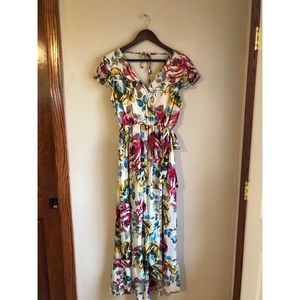 Faux wrap dress with slight high low hem